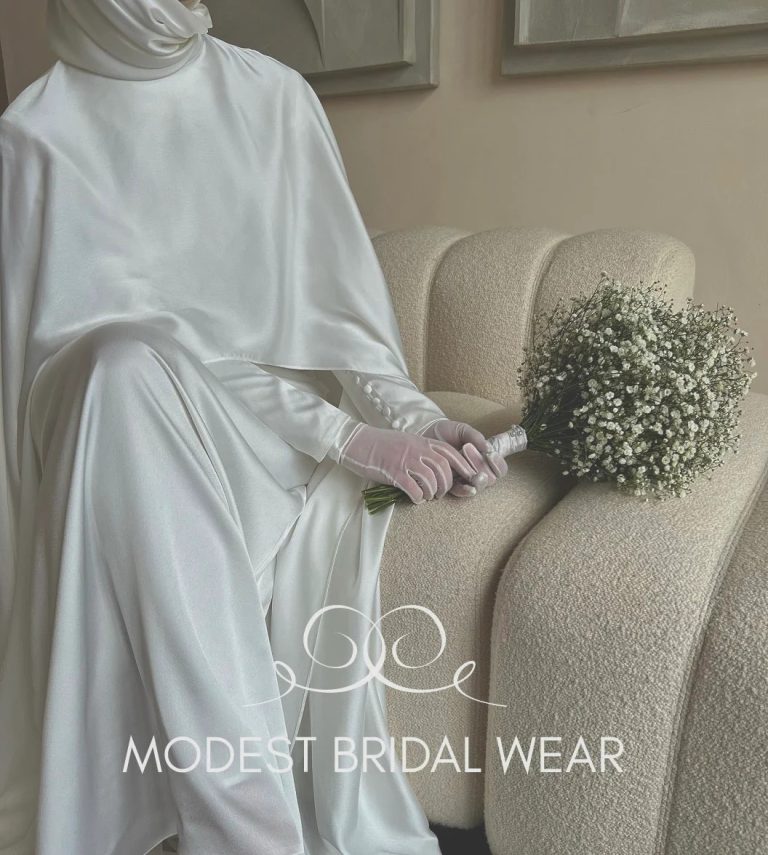 Elegant modesty: a bridal cape that shines